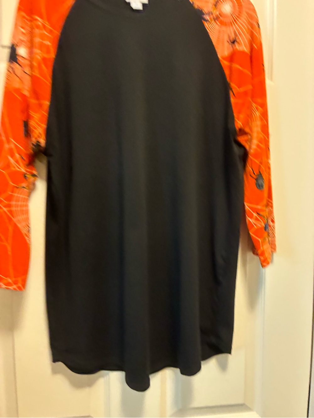 LuLaRoe Randy Black with Orange Spider-Web Print Sleeves Size XL
